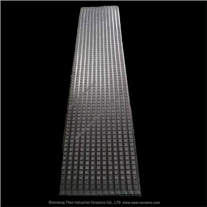 Slidfast keramisk foring af transporttromlen